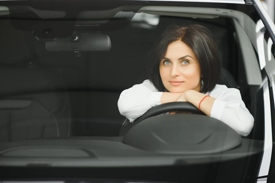 Woman behind the wheel of a car